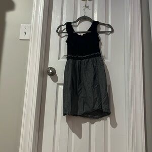 Grey and black dress with ruffles at the top sleeveless
